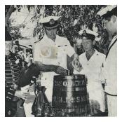 The last issue of a tot of rum 'aboard' HMS Jufair, 2 R IRISH Bahrain.