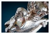 Detail of a silver Royal Irish Regiment cap badge sculpture