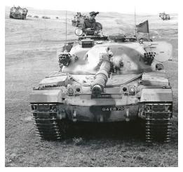 The Commanding Officer 2 R IRISH commands from a Chieftan tank.